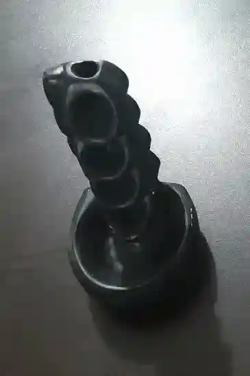 جاعودی آبشاری سنگ مصنوعی مشکی با طراحی پلکانی مخصوص نمایش ریزش دود عود آبشاری